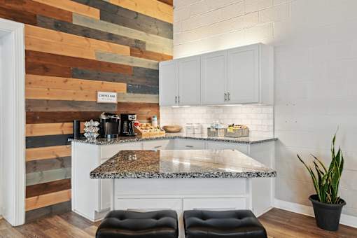 Kitchen with white cabinets and a marble counter top  at Emerald Bay, Charlotte, 28217
