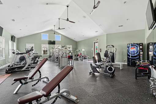 Fitness center with cardio and weight machines at The Lory of Greenway Village Apartments, Kentucky