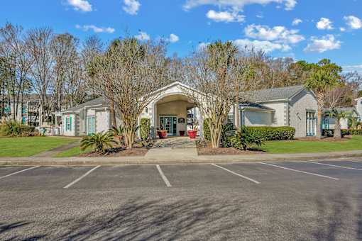 A house with a driveway and a parking lot  at Cape Landing, Myrtle Beach