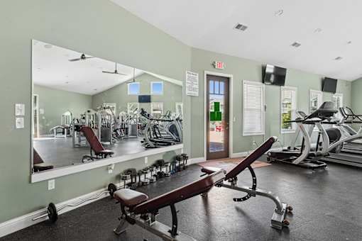 Fitness center with cardio and weight equipment at The Lory of Greenway Village Apartments, Kentucky, 42001