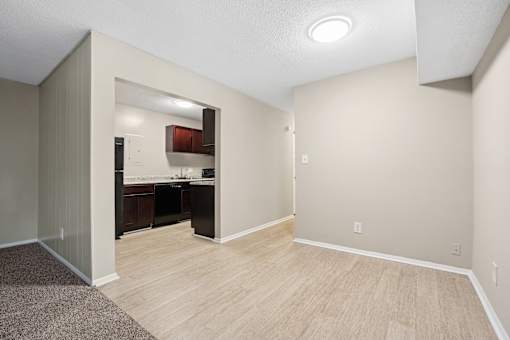 Open dining room with view into kitchen at The Palms Apartments, Charleston, 29407