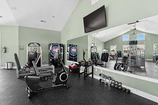 Fitness center with cardio and weight training equipment at The Lory of Greenway Village Apartments, Kentucky, KY 42001