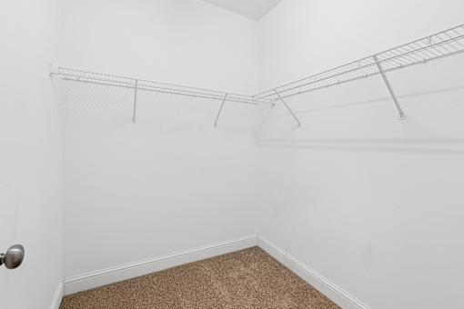 Walk-in closet with wire shelving at The Lory of Greenway Village Apartments, Kentucky, 42001
