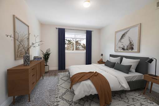 A bedroom with a large bed and a wooden dresser.