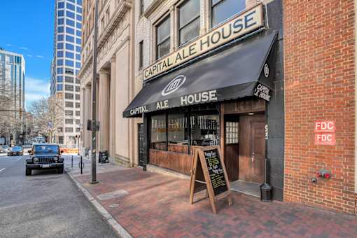 the facade of the central ale house on a city street
