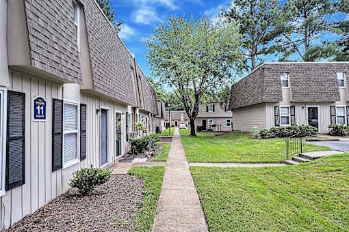 A row of houses with number 11 on the first one.