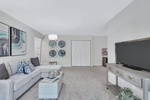 a living room with a couch and a coffee table