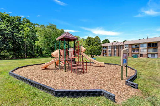 playground at the whispering winds apartments in pearland, tx