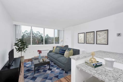 a living room with a couch and a tv