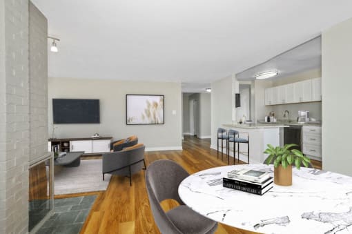 Open concept living room with fireplace and kitchen