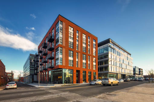 a rendering of a large building on a city street