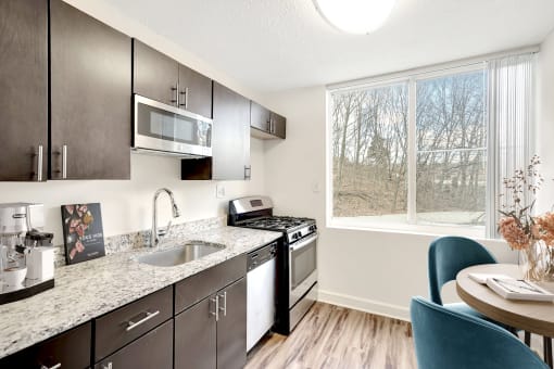 our apartments offer a modern kitchen with granite counter tops and stainless steel appliances