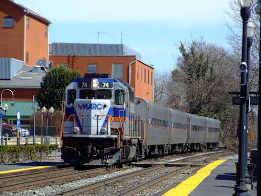 A MARC train is on the tracks.