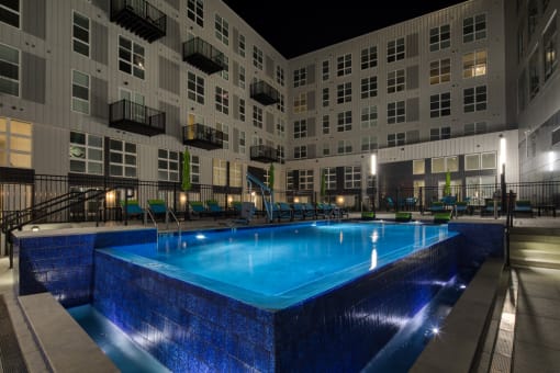 the swimming pool at night at the grove resort  spa