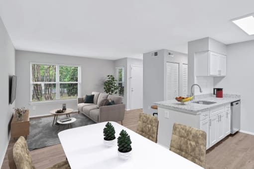 a kitchen and living room in a 555 waverly unit