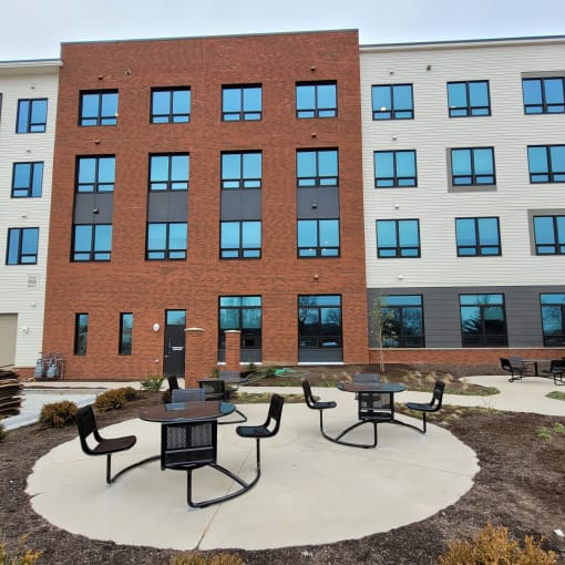 Apartment building exterior and outdoor seating area-Beecher Terrace I, Louisville, KY