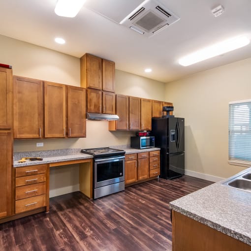 Community room kitchen, Wheatley Park Senior Apartments San Antonio, TX