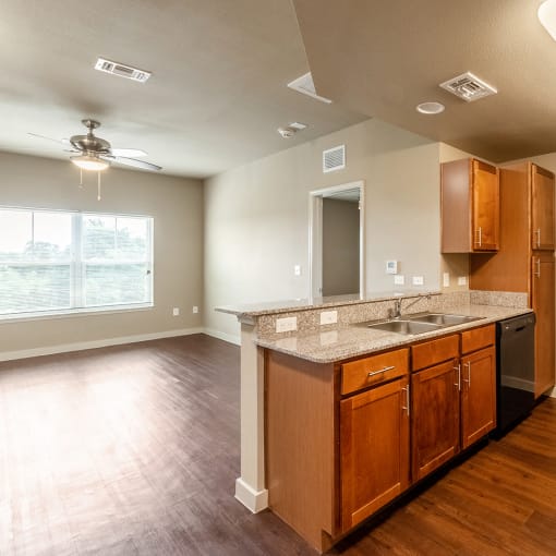 Apartment kitchen and dining area, Wheatley Park Senior Apartments San Antonio, TX