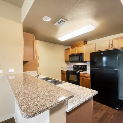 Apartment kitchen, Wheatley Park Senior Apartments San Antonio, TX
