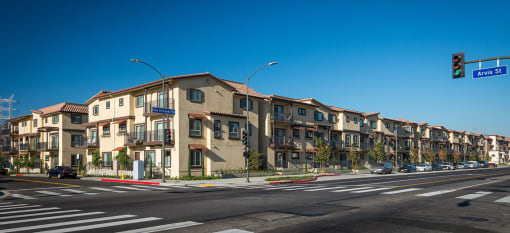 Taylor Yard apartment buildings on a city block with a traffic light in frame
