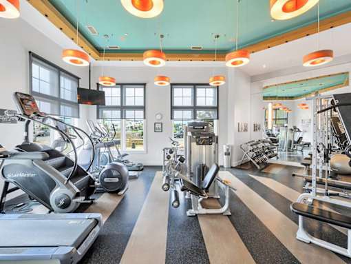 Health club with Precor treadmills, ellipticals, stair climber, strength and circuit-training equipment at The Beacon at Waugh Chapel, Maryland