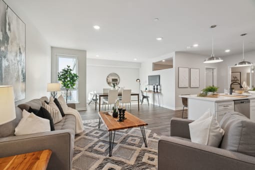 a living room with couches and a table