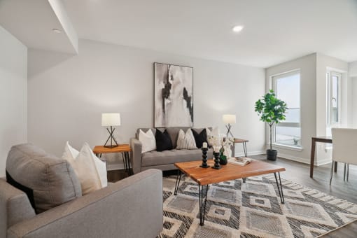 a living room with couches and a coffee table
