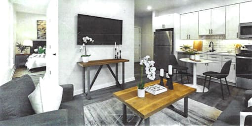 A modern living room with a grey couch and a wooden coffee table.
