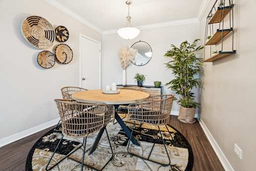 Dining room with round table at Esplanade at City Park, Louisiana