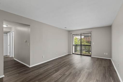 Livingroom with wood style flooring at Creve Coeur, Creve Coeur, MO