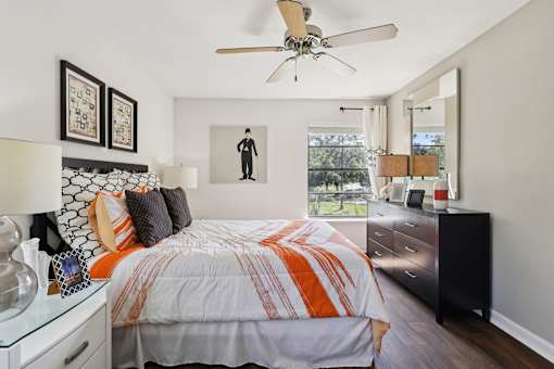 Bedroom with Bed at Whisper Lake Apartments, Winter Park, FL