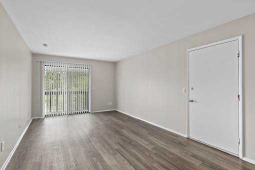 Livingroom with wood style flooring at Creve Coeur, Creve Coeur, MO