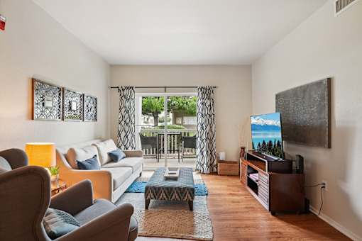 Living Area With Balcony at Heritage at Stone Mountain, Northglenn, 80233