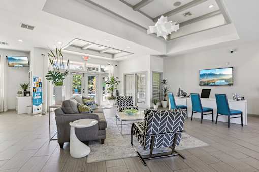 Clubhouse lobby with contemporary furniture and tray ceiling at The Arbor Walk Apartments, Florida, 33617