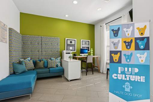 Pet friendly lounge with playful dog art at The Arbor Walk Apartments, Tampa, FL