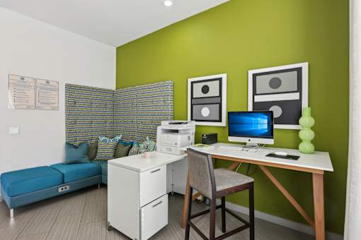 Home office with desk and daybed seating at The Arbor Walk Apartments, Tampa, 33617