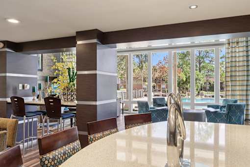 Modern kitchen with large dining area at Whisper Lake Apartments, Florida,32792