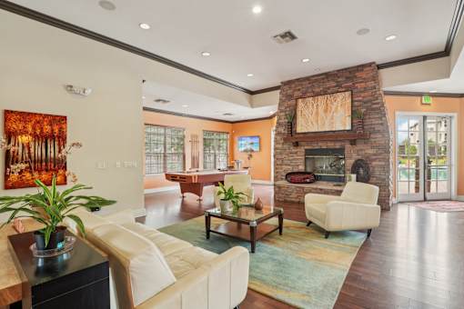 Clubroom With Fireplace at Heritage at Stone Mountain, Northglenn, Colorado