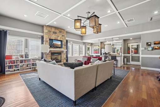 Clubroom With TV at Deer Crest Apartments, Broomfield