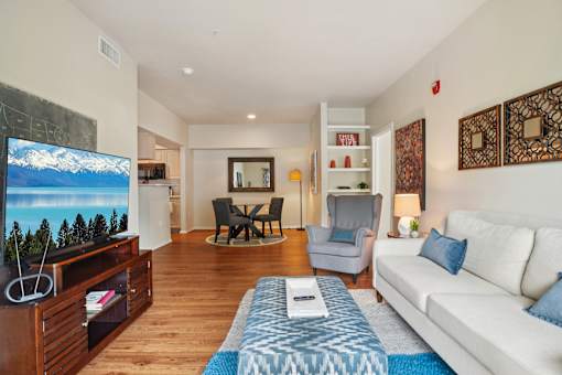 Living Room With TV at Heritage at Stone Mountain, Colorado, 80233