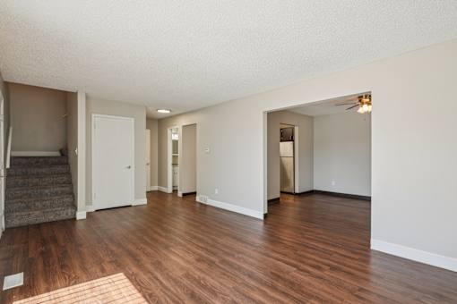 A room with wooden floors at Aspen Townhomes, Colorado Springs, CO