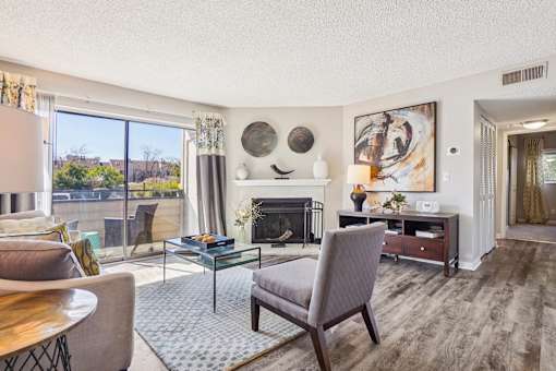 Living Room With Fireplace at Deer Crest Apartments, Broomfield