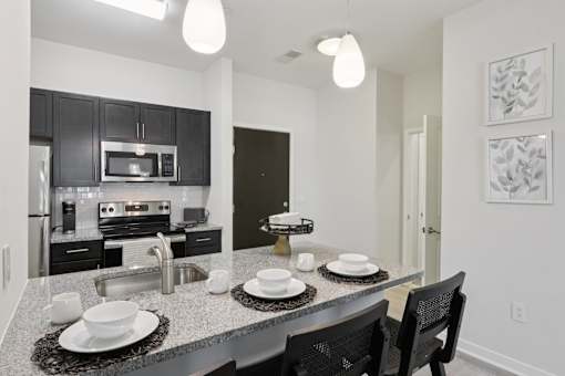 Modern Kitchen with dining table at The View at Old City, Philadelphia