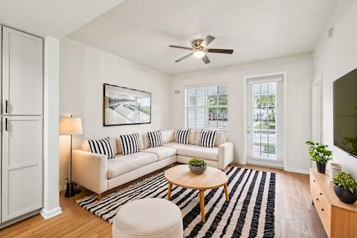 Living Room With Ceiling Fan at The Dakota, Jupiter, FL, 33458