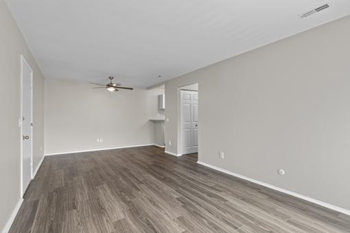 Livingroom with wood style flooring at Creve Coeur, Creve Coeur, MO