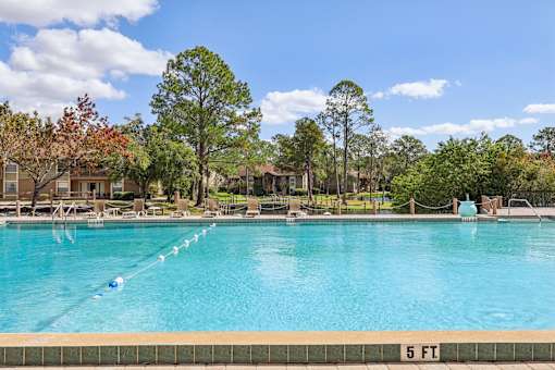 Swimming pool with a 5 ft marking at Whisper Lake Apartments, Winter Park