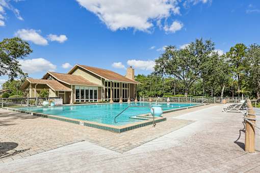 Pool in front of house at Whisper Lake Apartments, Winter Park, FL