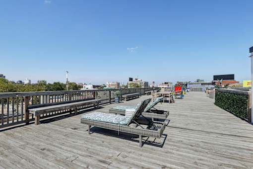 Wooden deck with lounge chairs at The View at Old City, Philadelphia, PA
