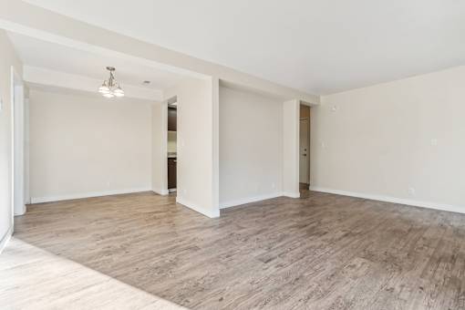 A room with wooden flooring and white walls. at Cliffs at Canyon Ridge, Utah, 84401