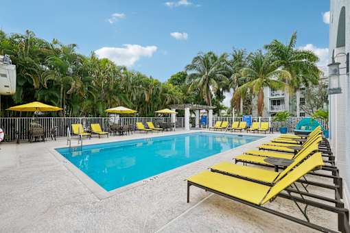 Pool With Lounge Chairs at The Dakota, Jupiter, FL
